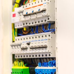 Electric panel in the house. Selective focus. White.
